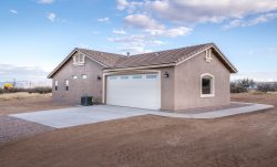 The garage end of new residence built in Hereford Arizona by Isaacson Homes, LLC