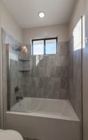 Ceramic Tile Shower Surround and glass panel