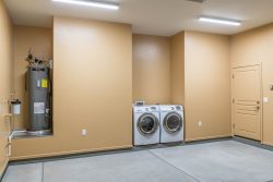 Garage with Water heater and laundry utilities