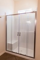 fiberglass shower surround with glass slider doors