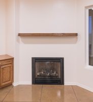 Fireplace inset with real wood mantle