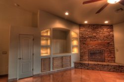 custom built in entertainment center with lighted niches