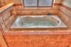 jetted tub with tile surround decor